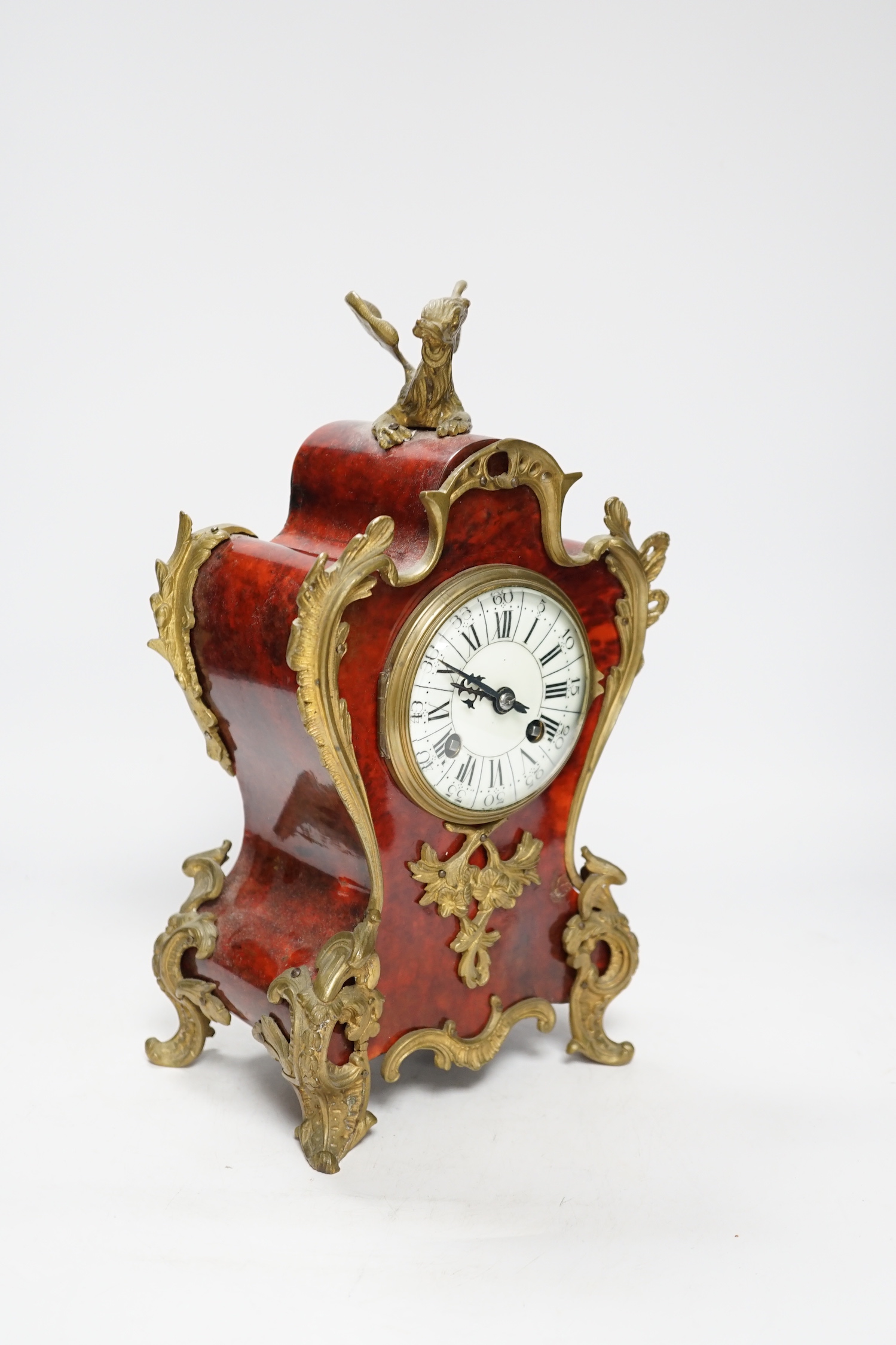 An early 20th century French tortoiseshell mantel clock with dragon mount, 30cm